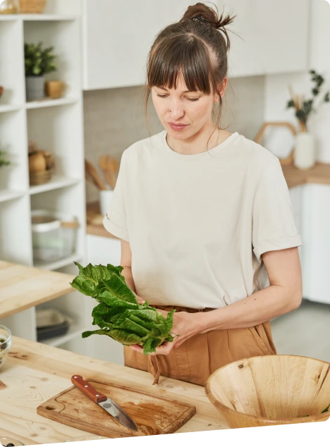 It is an image of women cutting vegetable